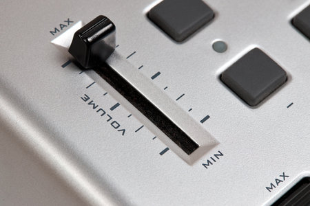Midi keyboard controller close up with faders wheel buttons and knobs pitch, band, modulation, octave max minの写真素材