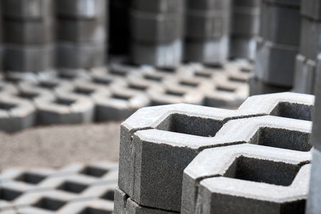 Checkered Concrete Cinder Tiles Of A Garden Sidewalk Lawn In Palette. Turf Grass Block Paving Stones. Grasscrete is eco friendly material for driveways, parking lots or garages instead of concreteの写真素材