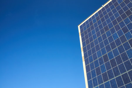 Many solar panels texture with copyspace. Building with lots of solar panels. Renewable solar energy. Alternative Generator Energy efficient house uses solar energy of sunの写真素材