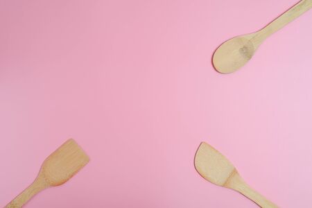 Wooden spatulas on three corners.の写真素材