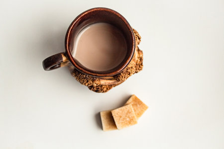 Beautiful ceramic mug with drink view from topの写真素材