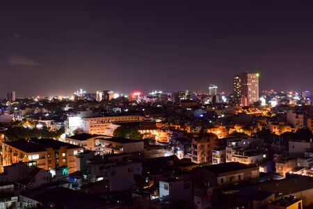 Vietnam, Ho Chi Minh city - 5 April 2017. View of the night city life from hotel roof. Photo taken with long exposureのeditorial素材