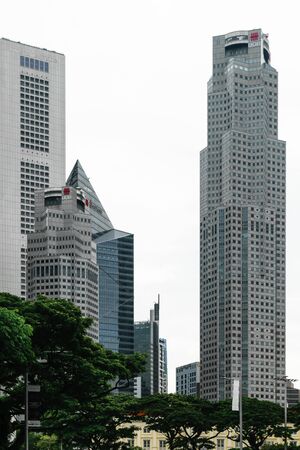 Singapore - 14 OCT 2018. Business district with modern skyscrapers during cloudy and rainy dayのeditorial素材