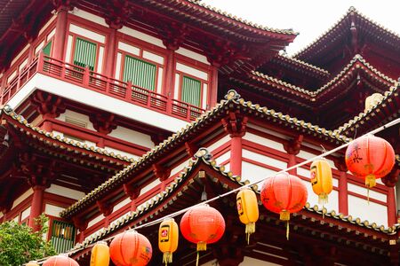 Singapore - 14 OCT 2018. The Buddha Tooth Relic temple and museum during cloudy and rainy day in Chinatown districtのeditorial素材