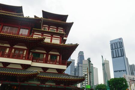 Singapore - 14 OCT 2018. The Buddha Tooth Relic temple and museum during cloudy and rainy day in Chinatown districtのeditorial素材