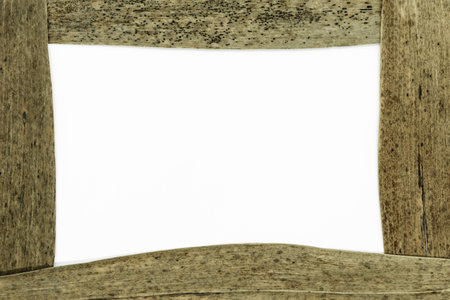Composition of frame from dry brown reed leaves and white area in the centerの写真素材