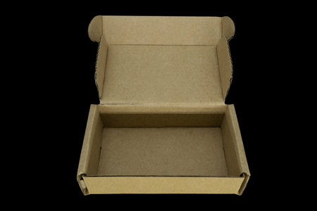 Top and perspective view of opened cardboard rectangle box isolated on black background
