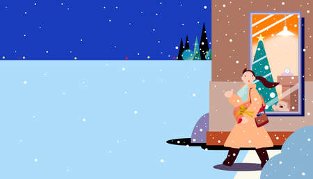 A woman who buys Christmas gifts and goes homeの写真素材