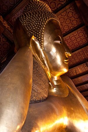 Half of reclining buddha in Wat Pho of Bangkok, Thailandのeditorial素材
