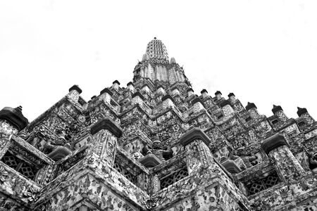 Black and white uprisen angle of Phra Prang at temple of dawn, Thailandの写真素材