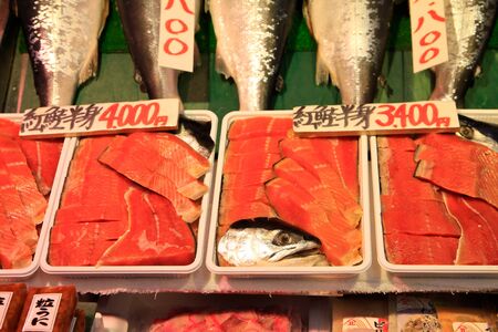 Salmon material preparation in marketの写真素材