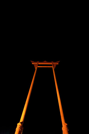 Red swing with night shot in Thailandの写真素材