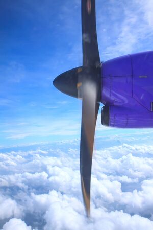 Airplane propeller during flying on the skyの写真素材