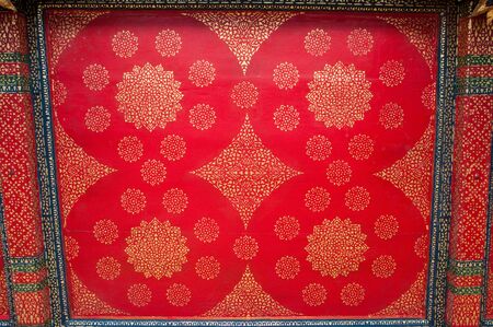 Buddhist artistic background design in templeの写真素材