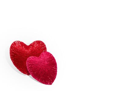 Two hearts made of threads isolated on white background. Valentine's day greeting card. Love, passion, romance and family concept. Copy spaceの写真素材