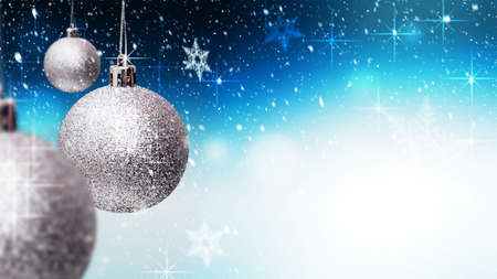 Silver Christmas balls over blue background with snowflakes. Banner. Merry Xmas and Happy New Year concept. Copy spaceの写真素材