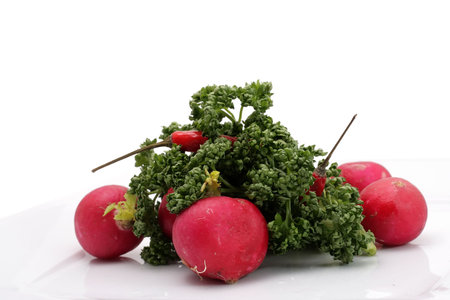 Vegetables on a plate. Isolated on a white background