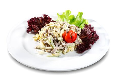 Salad from Beef and Vegetables. Serve on a Plate with Tomato and Greens. Isolated over Whiteの写真素材
