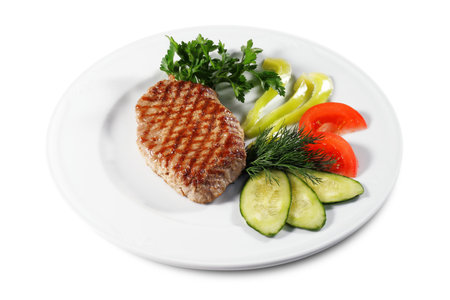 Pork Steak with Vegetables. Isolated on White Backgroundの写真素材