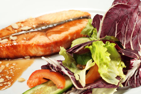 Grilled Salmon with Sauce and Vegetablesの写真素材