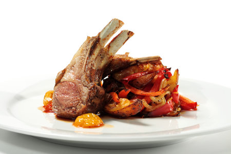 Roasted Lamb Chops with Asian-Style Vegetables. Isolated on White Backgroundの写真素材