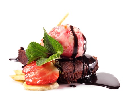 Dark Chocolate Pie with Berries Ice Cream and Fresh Mint and Fruit. Isolated on White Backgroundの写真素材