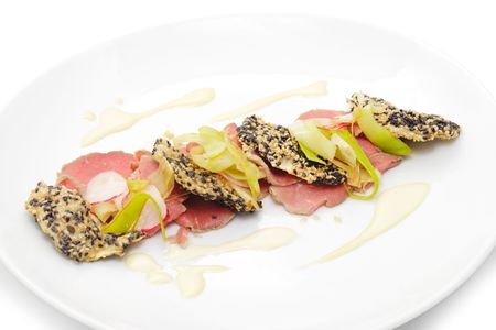 Veals Slice with Wasabi and Celery Chipsの写真素材