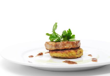 Pork Medallions with Sauce. Isolated on White Backgroundの写真素材