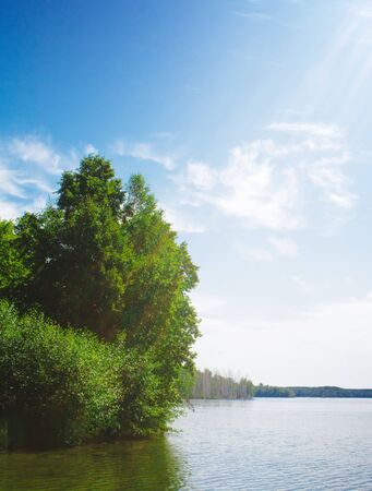 Blue Sky and Sunbeam and Beautiful Lakeの写真素材