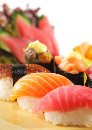 Japanese Cuisine - Sushi Set: Salmon, Conger and Tuna Sishi with Salad Leafの写真素材
