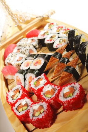 japanese Cuisine - Wooden Ship with Various Type of Sushiの写真素材