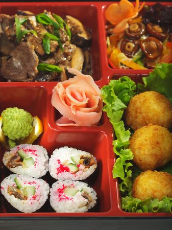 Japanese Bento Lunch - Mushrooms Salad with Hot Rice Appetizer and Hot Rollの写真素材