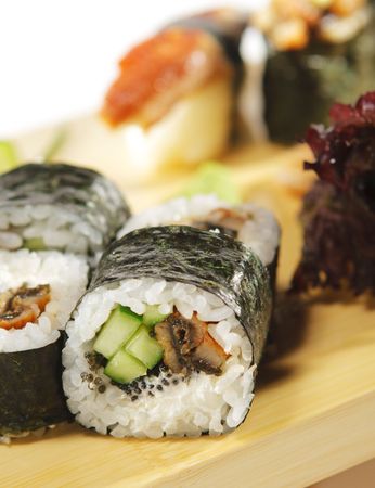 Japanese Cuisine - Conger Sushi Set with Salad Leaf and Cucumberの写真素材