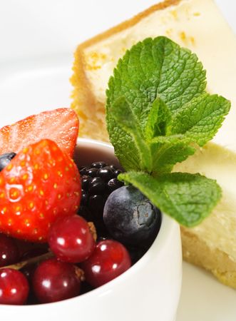 Dessert - Cheesecake with Fresh Berries Bowl and Green Mintの写真素材