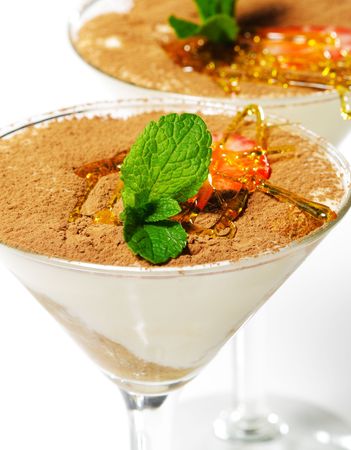 Tiramisu Dessert in a Glass with Mint and Strawberryの写真素材