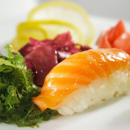 Japanese Cuisine -  Salmon Nigiri Sushi with Ginger and Seaweedの写真素材