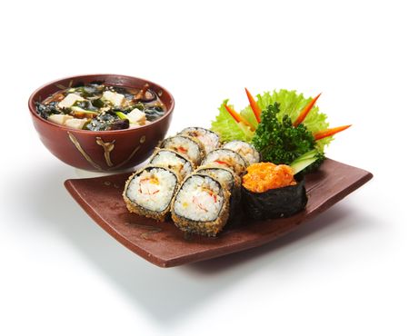 Japanese Cuisine -Tempura Maki Sushi (Deep Fried Roll made of Smoked Eel, Crab Meat and Cream Cheese inside) with Spicy Salmon (sake) Gunkan Sushi and Miso Soup (Seaweed, Mushrooms and Tofu Cheese)の写真素材