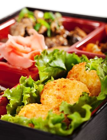 Japanese Bento Lunch - Mushrooms Salad with Hot Rice Appetizer and Hot Rollの写真素材