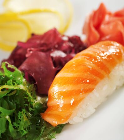 Japanese Cuisine -  Salmon (sake) Nigiri Sushi with Ginger and Seaweedの写真素材