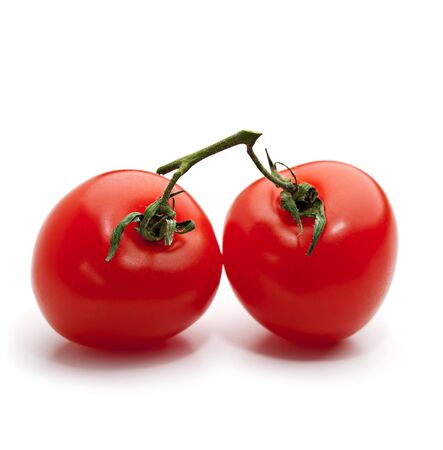 Cherry Tomato Isolated over Whiteの写真素材