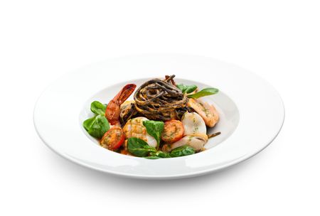 Seafood Spaghetti with Tiger Prawns, Scallops, Mussels, Calamari, Salmon and Tomato Sauceの写真素材