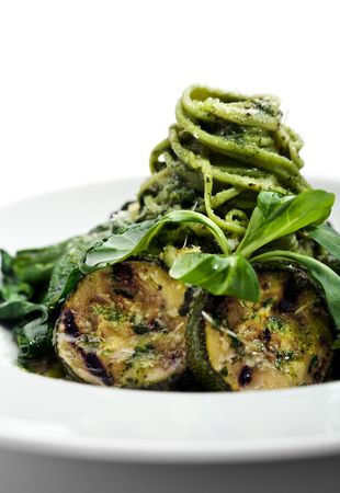 Green Spaghetti with Zuchinni, Fresh Spinach and Pesto Sauceの写真素材