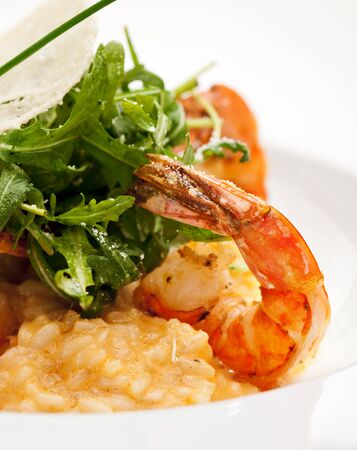 Risotto with Tiger Prawns and Rucolaの写真素材