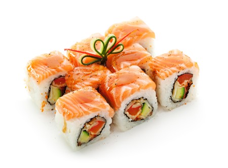 Maki Sushi - Roll made of Smoked Eel, Cream Cheese and Deep Fried Vegetables inside. Fresh Salmon outsideの写真素材