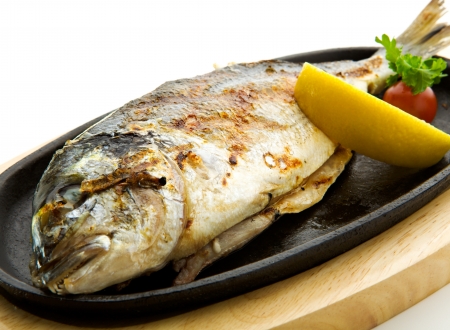 Grilled Foods - Grilled Fish with Lemon and Cherry Tomatoの写真素材