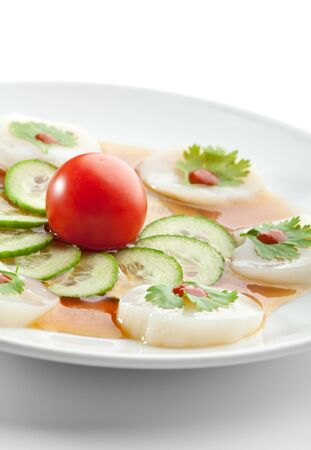 Appetizer - Sea Scallop with Sauce and Cherry Tomatoの写真素材