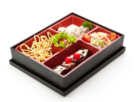 Meal in a Box (Bento) - Salad, Meat Balls, Potatoes, Dessert Maki Sushiの写真素材