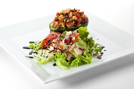 Avocado Salad - Mix of Salad Leaf, Stuffed Avocado, Paprika, Mushrooms, Balsamic Sauceの写真素材