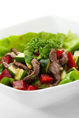 Salad with Veal and Vegetables on Salad Leafの写真素材