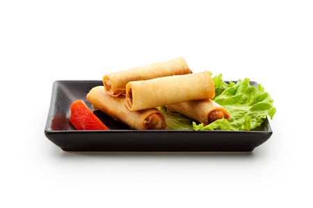 Fried Spring Rolls on Black Dishの写真素材